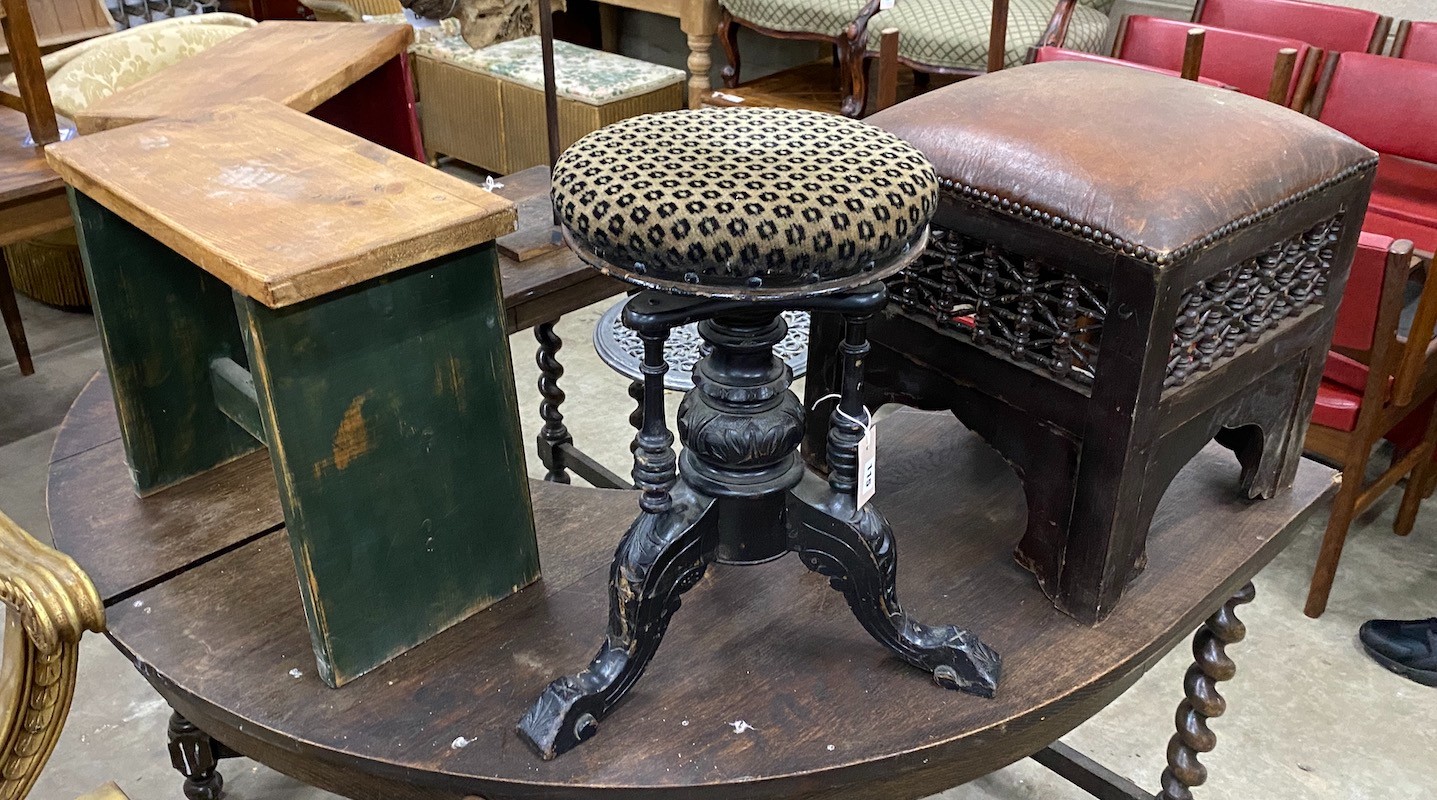 A Damascan footstool with leather seat, a Victorian adjustable piano stool and two painted pine stools